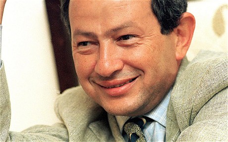 (FILES) Egyptian Naguib Sawiris, chairma...(FILES) Egyptian Naguib Sawiris, chairman of Egypt's Orascom Telecom, smiles as he answers reporters questions in Cairo. Italian group Enel SpA said 26 May 2005 in Milan it has signed an agreement to sell its wholly-owned telecommunications unit Wind to the fund Weather Investments Sarl, led by the Egyptian businessman Naguib Sawiris.   AFP PHOTO  FILES/eps
(Photo credit should read -/AFP/Getty Images)